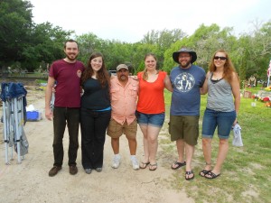 Group picture of Lionel and the UIndy Crew at Sacred Heart Burial Park