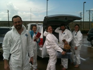 Group photo of the UIndy team in full body PPE suits