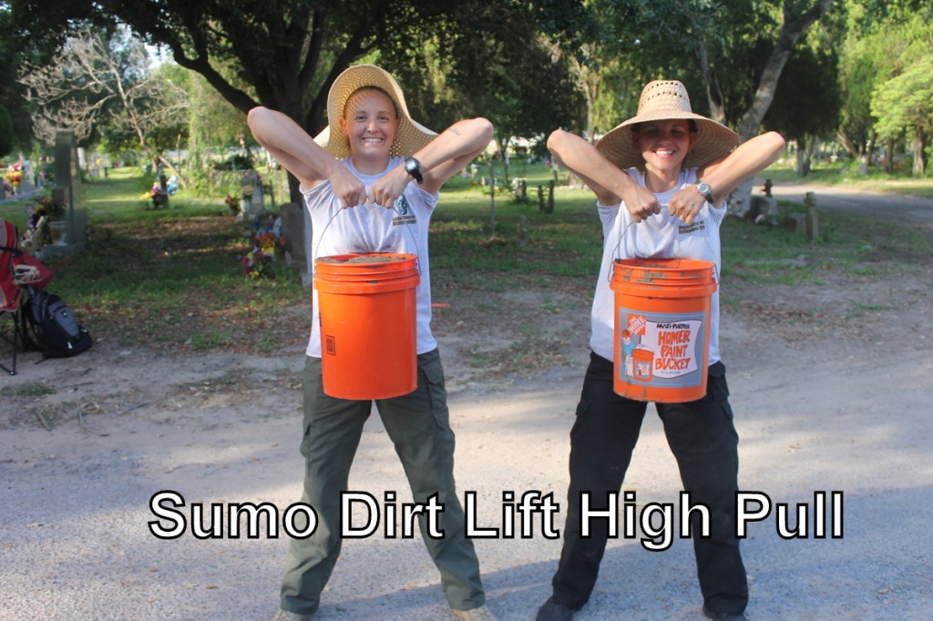Team members standing with 5-gallon buckets lifted to their chests