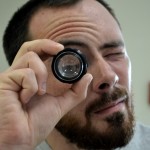 UIndy graduate student Ryan looking through an eyeloop