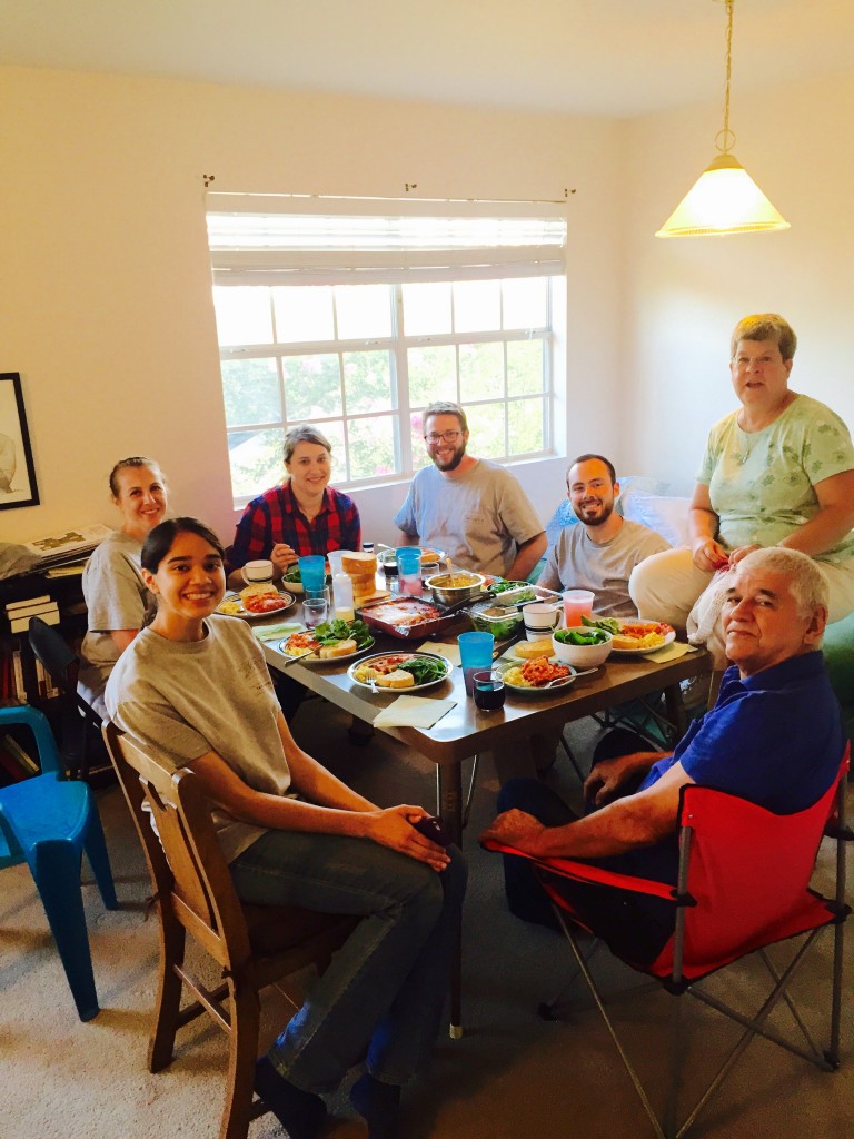 Group photo of the team having dinner with members from the South Texas Human Rights Center