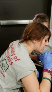 Erica conducting dental analysis