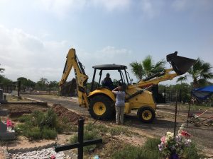Silvestre and the backhoe.