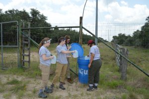 The team filling a water station