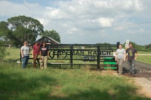 Group picture in front of the forensic anthropology center at texas state ranch front gate