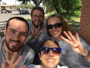 Day 4 group picture with all smiles and 4 fingers up