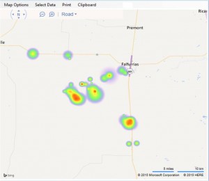 A small heat map over the area of Falfurrias depicting water stations and some data showing some red hot spots