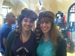 Two girls wearing coon hats