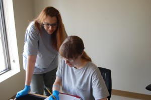 Dr. Latham and Helen working together on skeletal analysis 