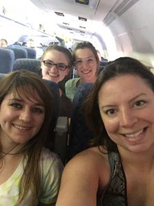 Team selfie on the plane.
