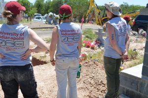 Team members looking over the cemetery.