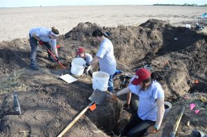 UIndy team working to uncover two burials.