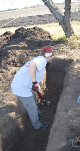 Jessica excavating a burial.