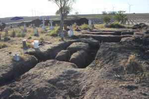 Exposed trenches in the cemetery.