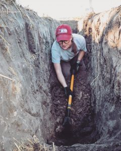 Leanne excavating a burial.