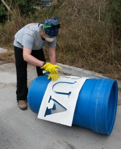 Erica painting new barrels