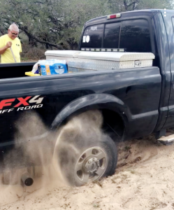 Deputy Don's truck stuck in the dirt