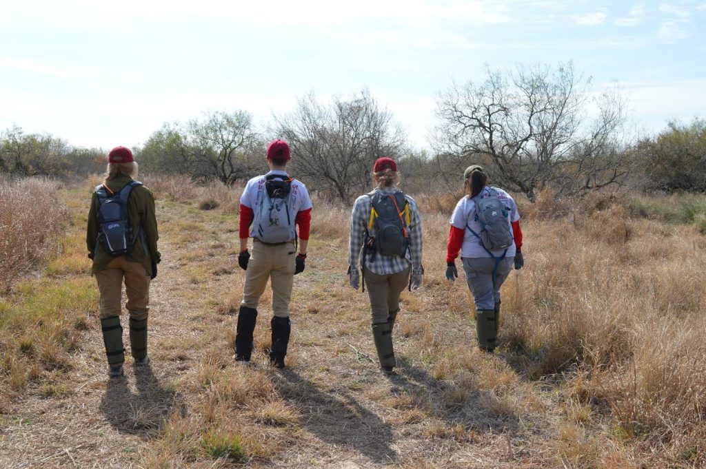 Team photo in the brush