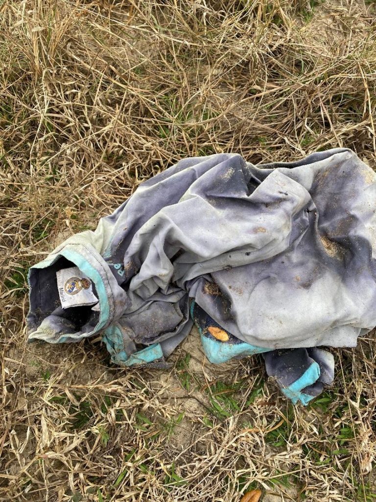 Youth soccer jersey found in the brush