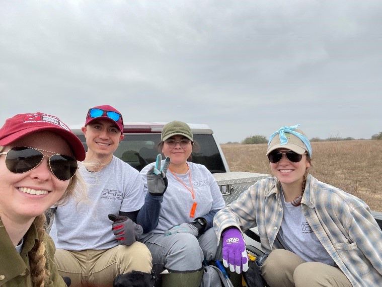 Beyond Borders Team riding in the back of a truck