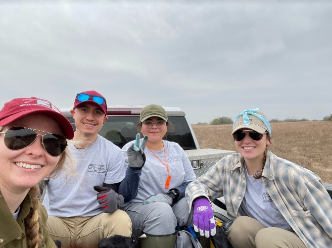 Beyond Borders Team riding in the back of a truck