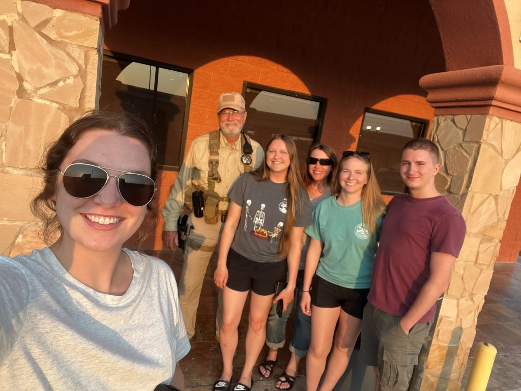 Group photo outside of a restaurant 