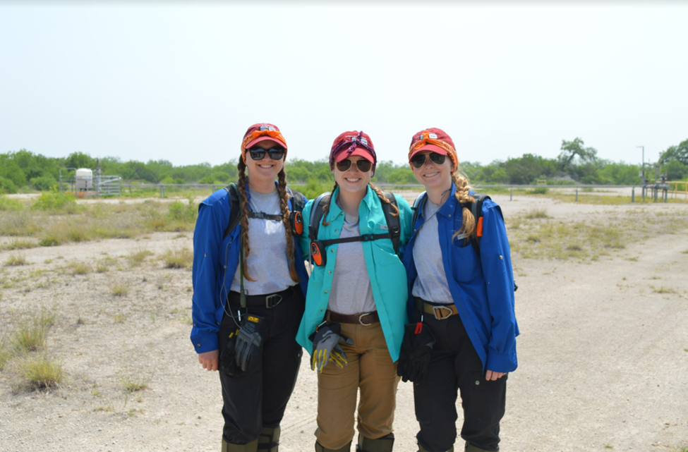 Group photo of three beyond Borders May 2022 team members