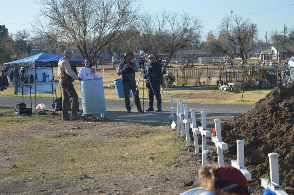 Deputy White  talking to one of the media outlets