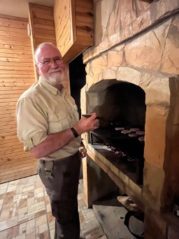 Deputy White grilling burgers 