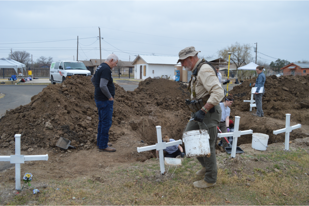  Deputy Don White and Eddie Canales assisting with the exhumations 