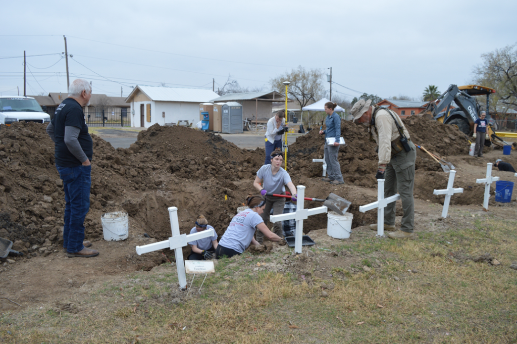 UIndy Team and Texas State Team Members Working on uncovering burials 