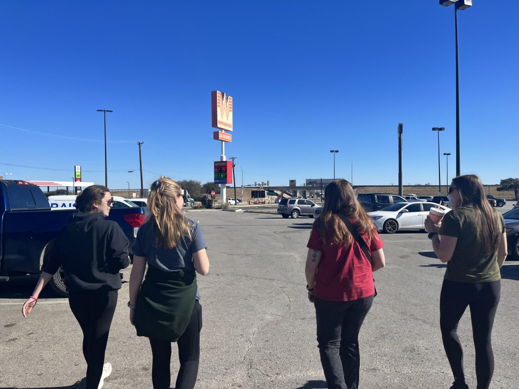 The Beyond Borders team in the Whataburger parking lot