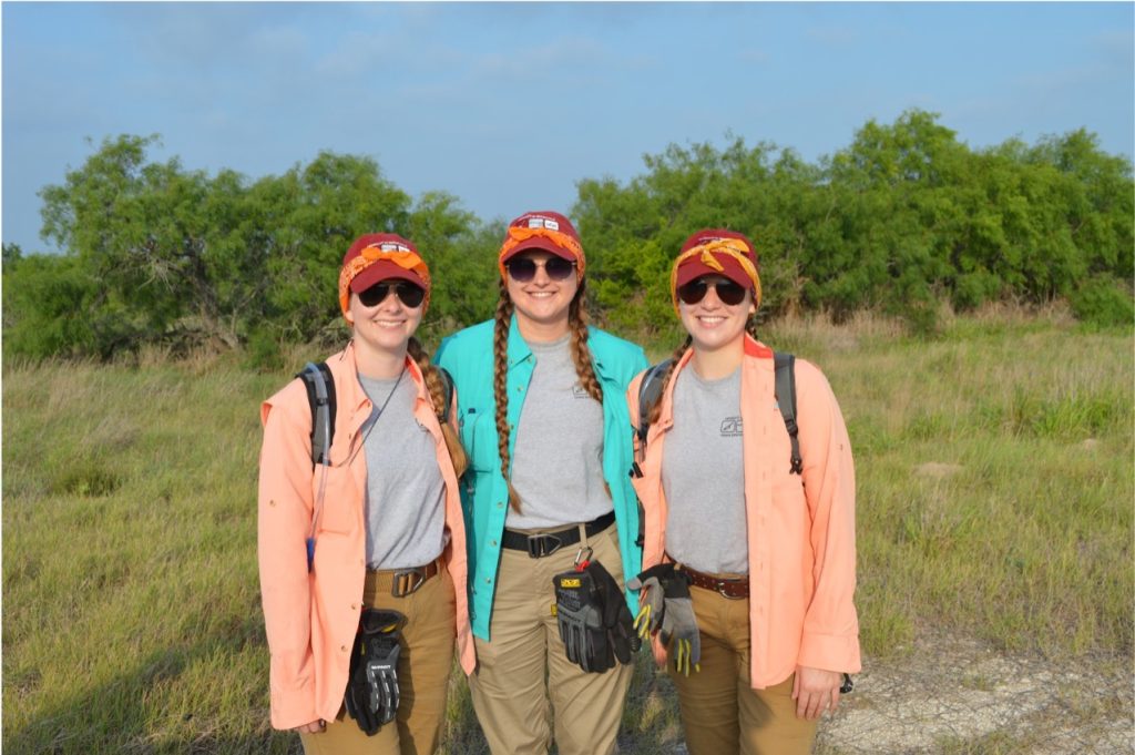 Team members posing for a photo before a search