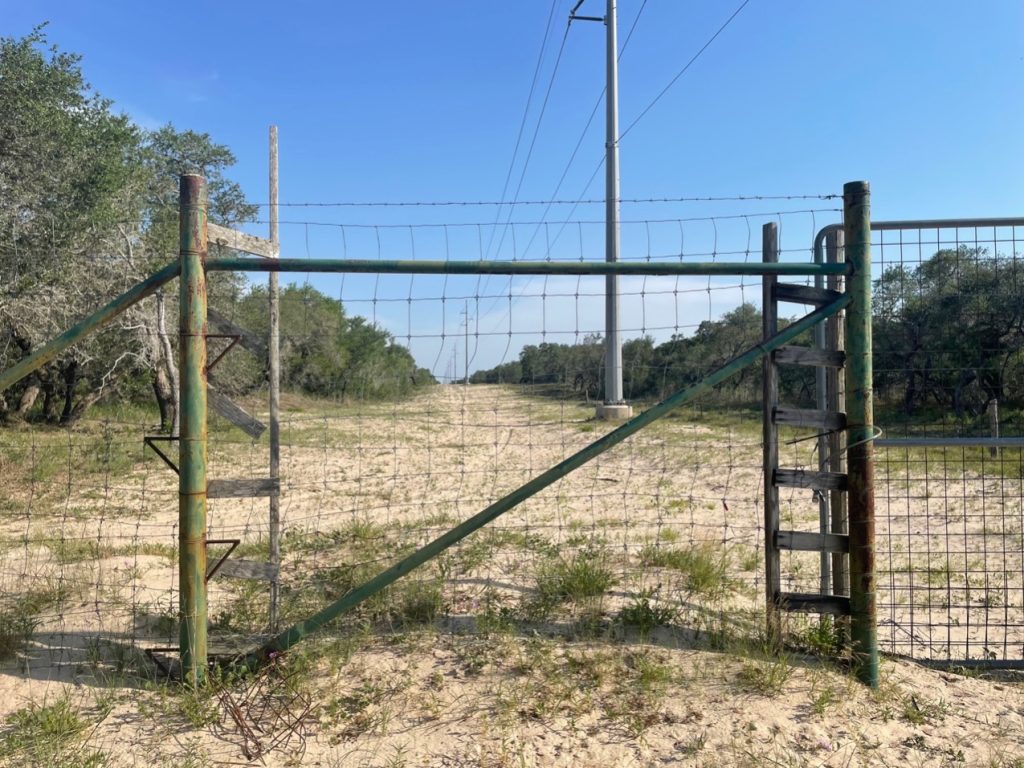 Ladders on a fence line to prevent damage to the fence