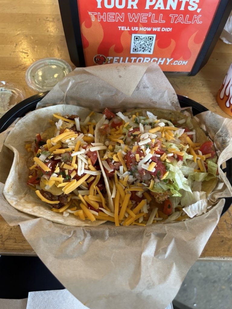 two tacos on a plate from Torchy's Tacos