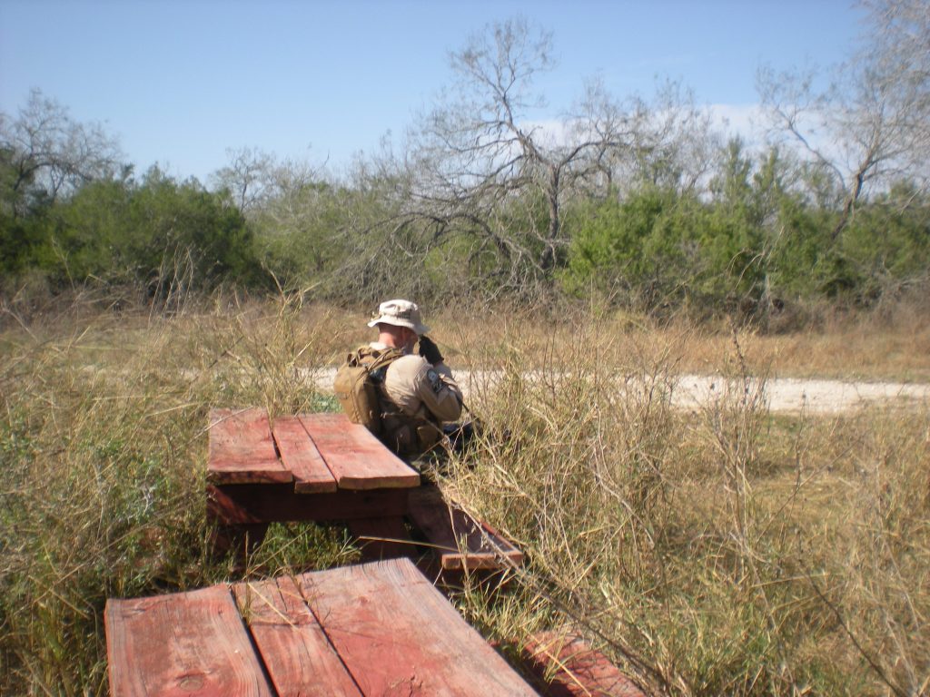 Deputy Don White rests while out on a ranch.