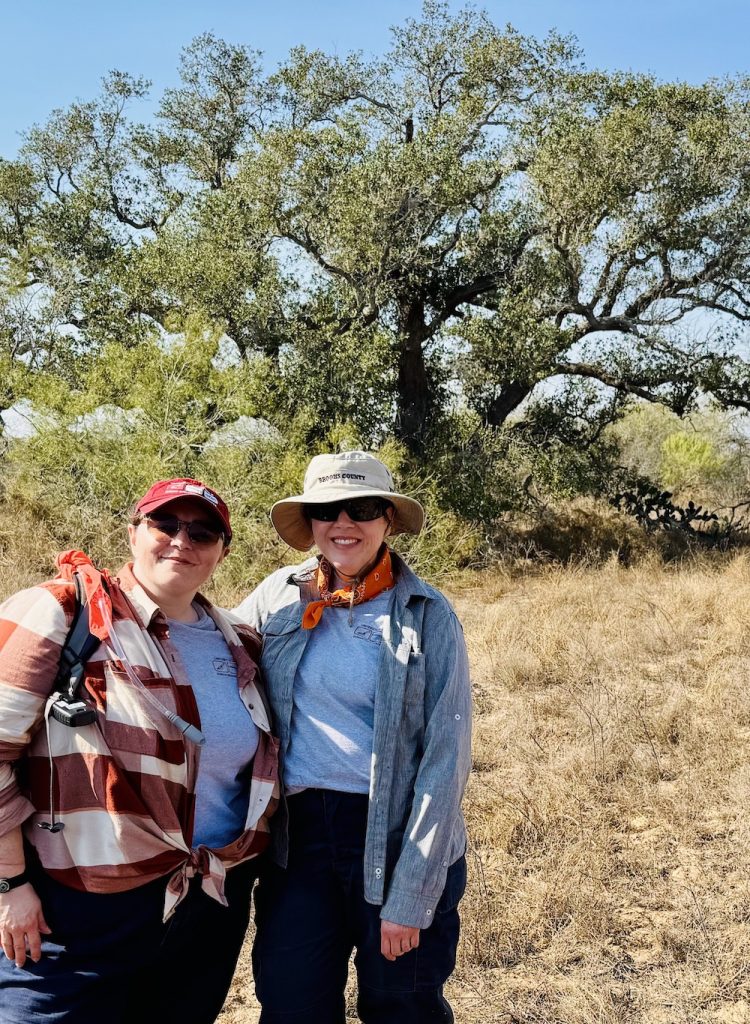 Dr. Eriksen and Dr. Latham standing in front of motte