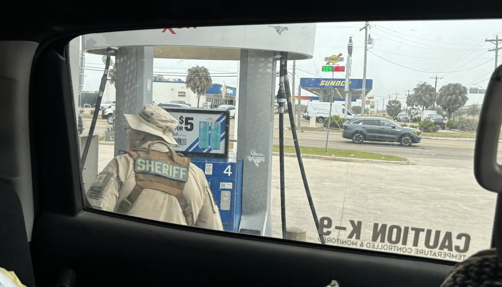 At the gas station pumping gas in the truck