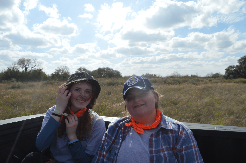 Makenna Mizell and Lilly Bucher in the back of Ray's truck