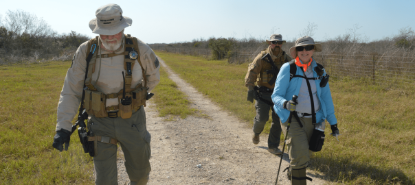 Dr. Latham, Don, and Ray on a walk through the ranch.